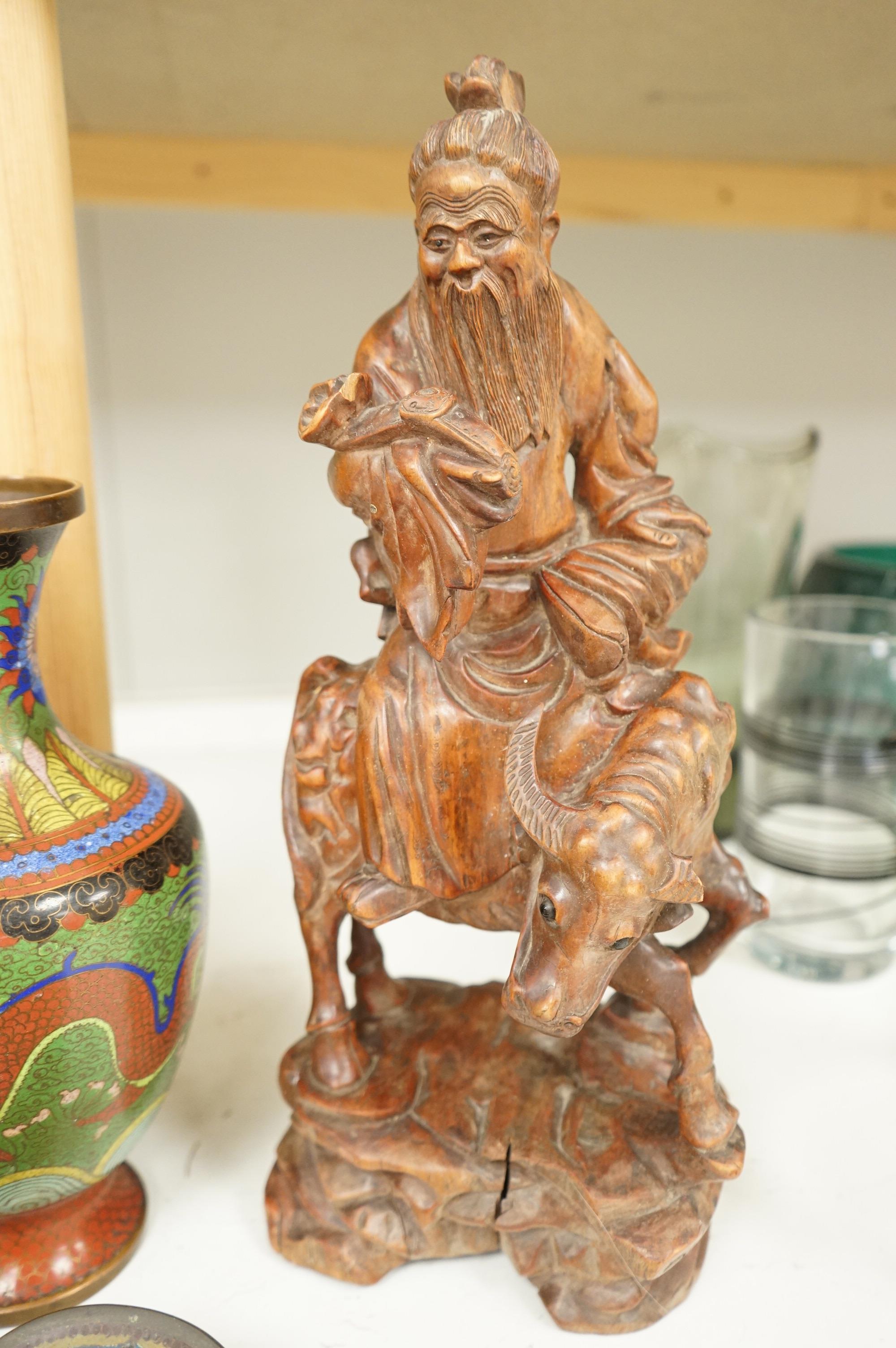A Japanese cloisonné enamel dish, a Chinese cloisonné enamel vase and three Chinese carved wood figures, largest 39cm high